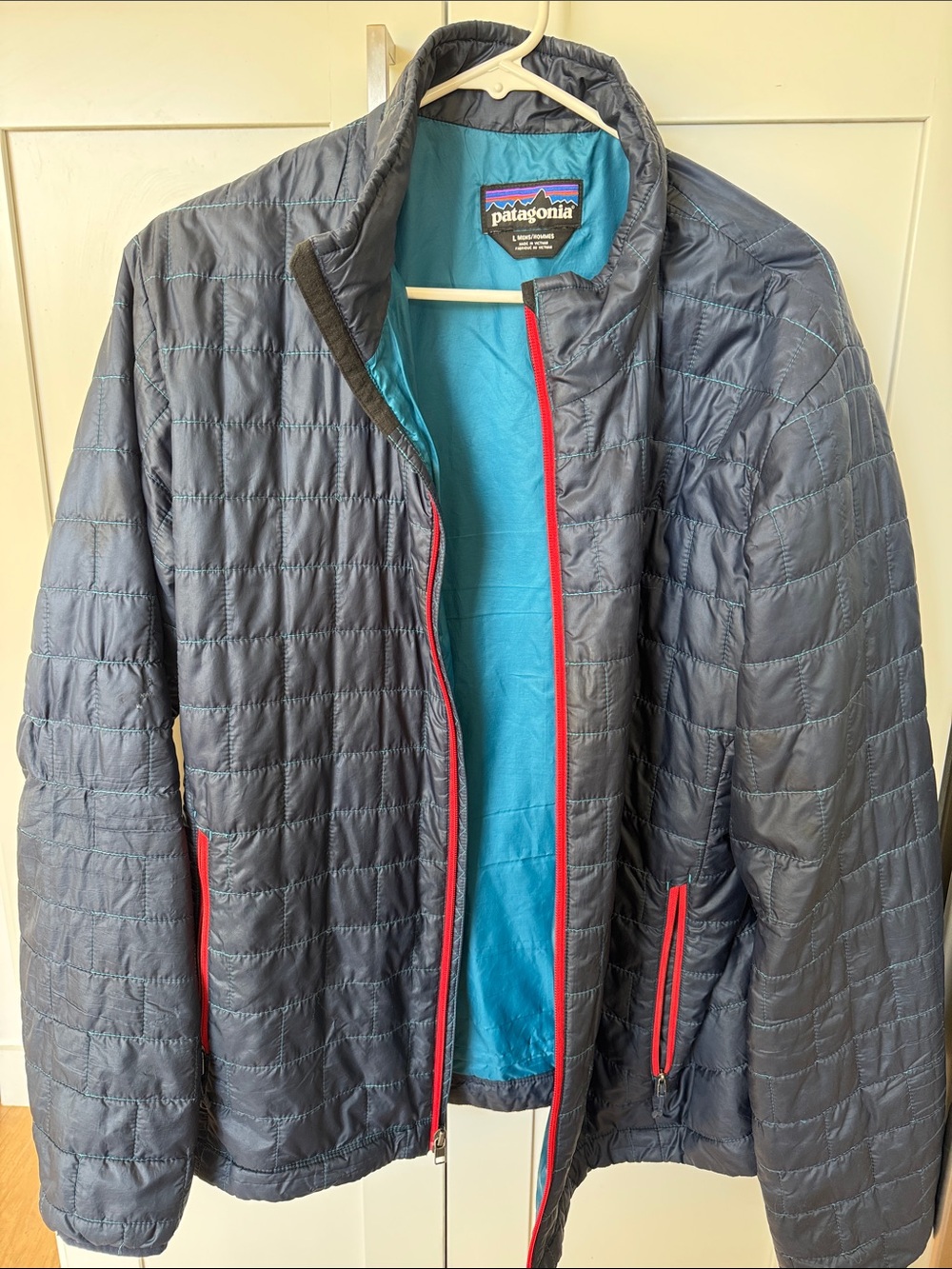 Patagonia Navy Puffer Jacket with Turquoise Lining and Red Trim